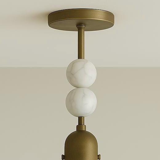 Antique brass canopy and downrod with veined marble spheres
