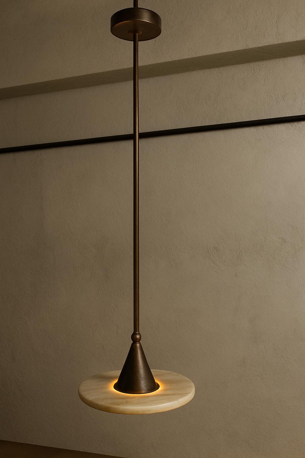 Alabaster disc pendant on long slender rod