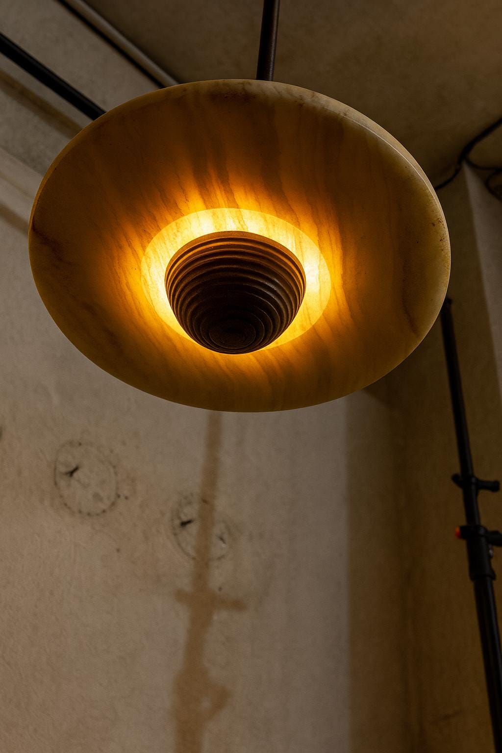 Alabaster disc glowing from below
