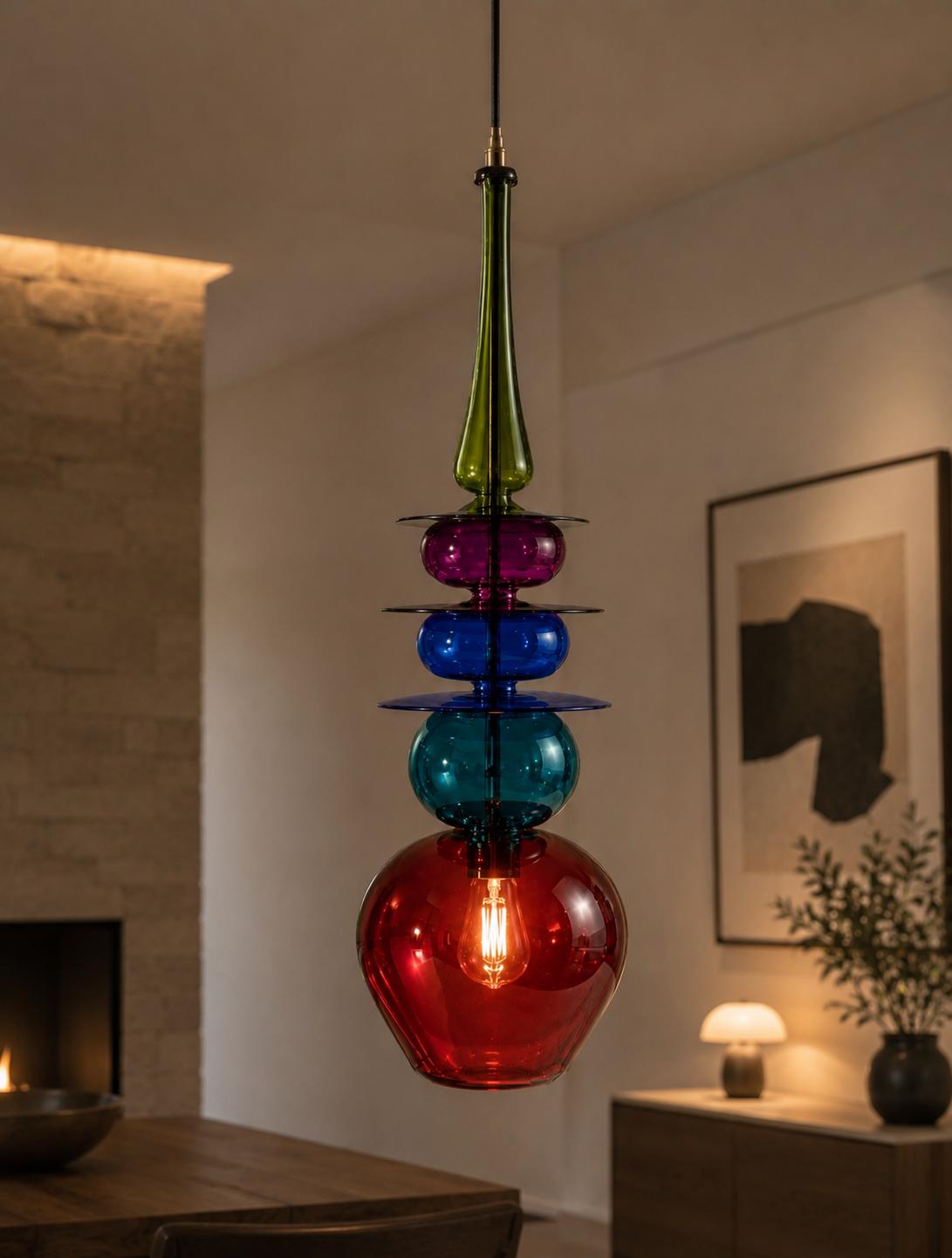 Sculptural glass pendant with green spire and red base